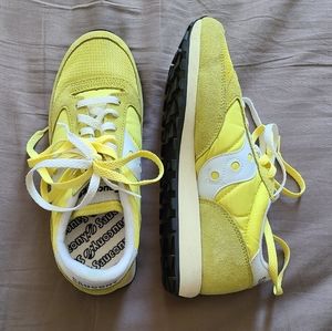 Yellow Saucony shoes
